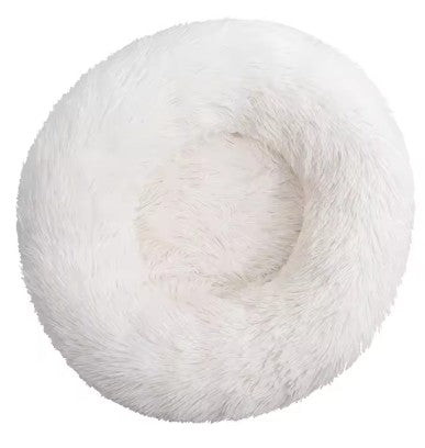 White fluffy donut-shaped pet bed on a white background