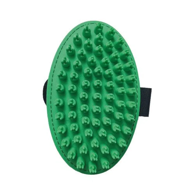Green grooming brush with textured surface on a white background