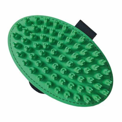 Green grooming brush with textured surface on a white background