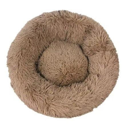 Fluffy brown pet bed on a white background